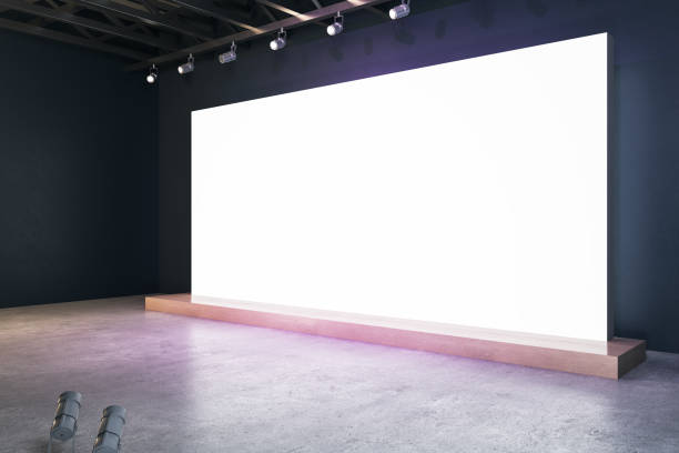 illuminated blank white billboard in interior with concrete flooring and mock up place for your advertisement. 3d rendering. - 數字展廳 個照片及圖片檔